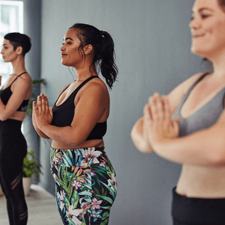 ladies doing yoga